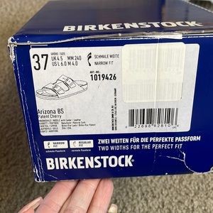 Brand new red patent leather Birkenstock sandals. Never worn.